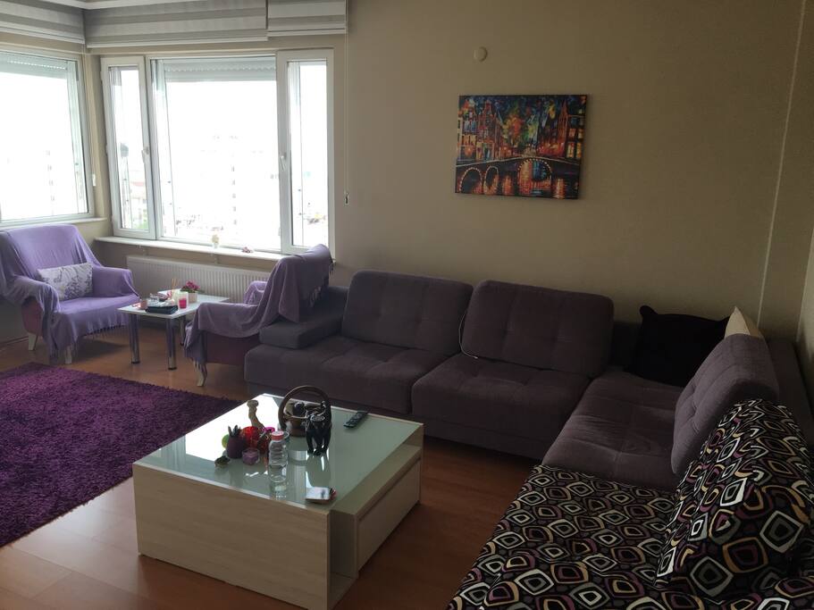 Living room with a big sofa & berjers