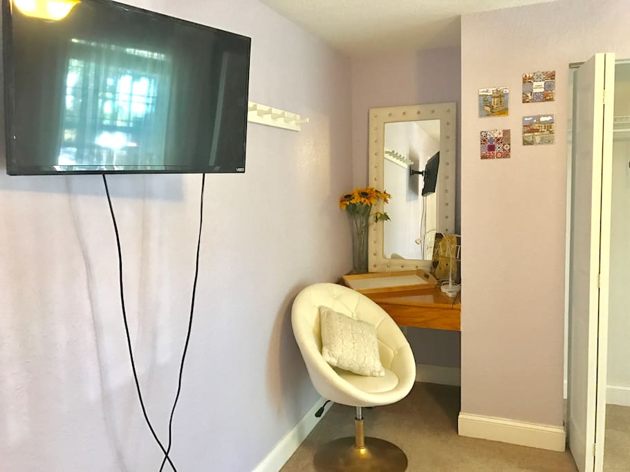 Smart tv with set up Netflix and laptop friendly area in your private bedroom