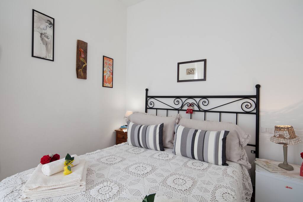 double bed, small fridge
