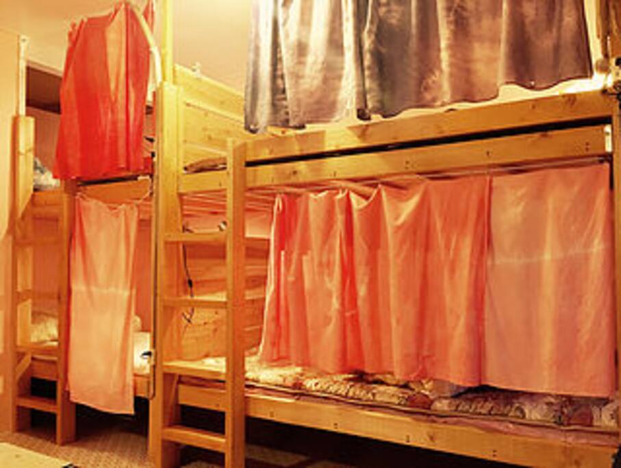 Each bed has the curtain to keep privacy.
Shared bed room. 3 bunk beds and 1 sofa bed are there.