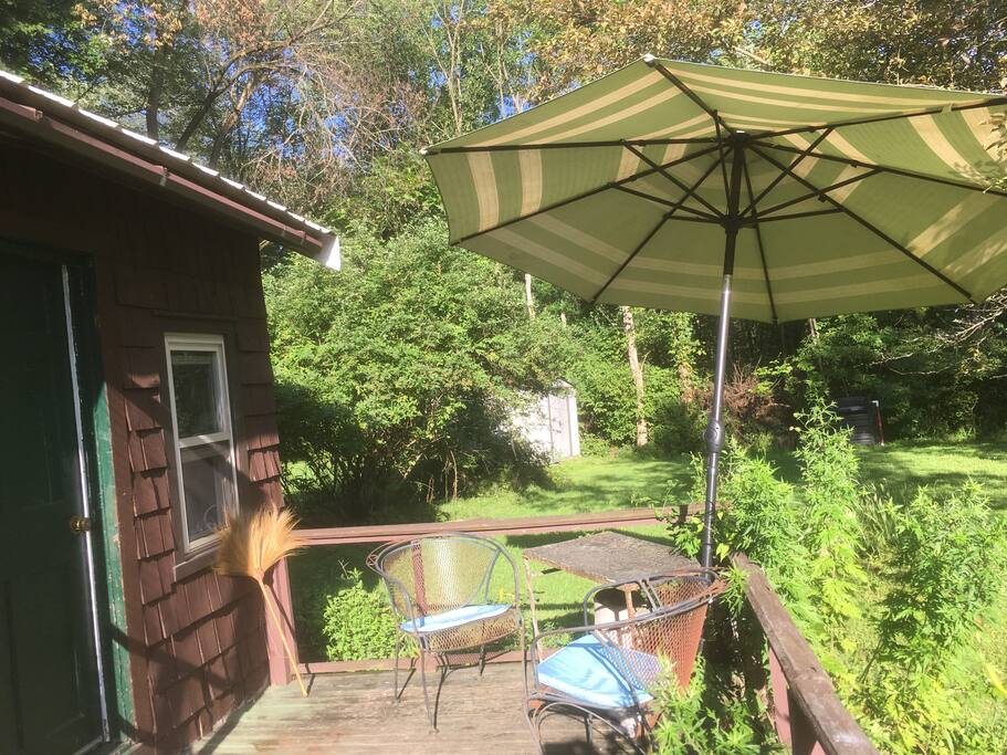 Out door table with chairs and umbrella