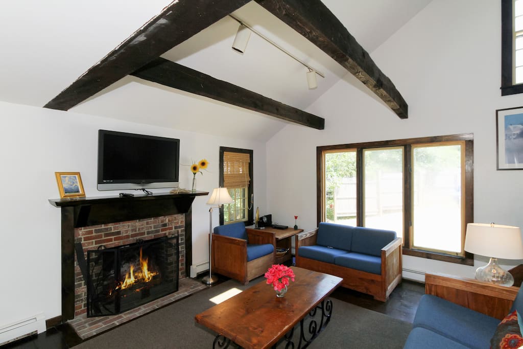 Beamed ceilings and original hardwoods add character to the living area.
