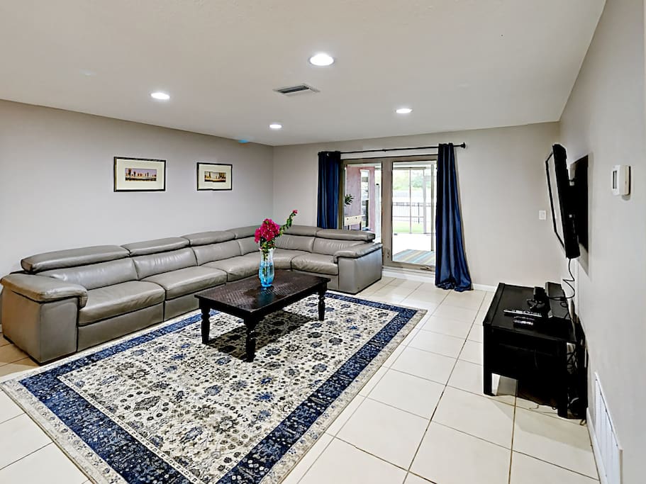 A large and comfortable couch offers seating in the living room