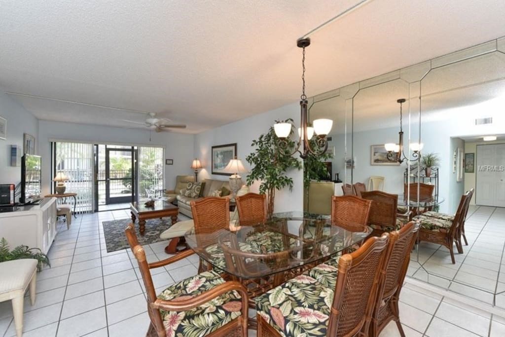 Dining Room and Living Room lead to porch and pool.