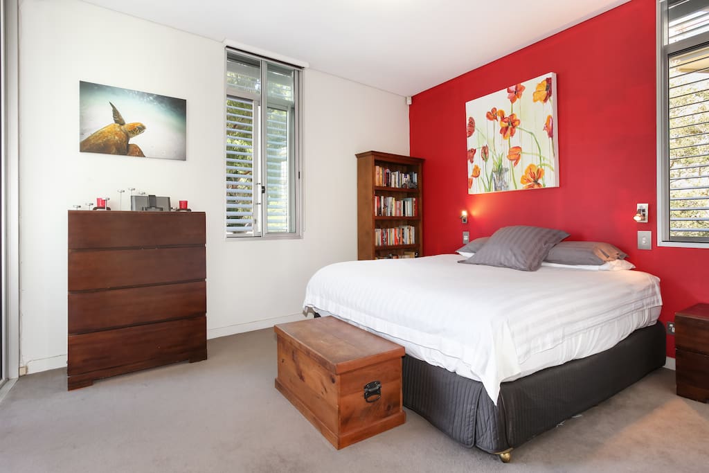 Master bedroom with view of the City, an ensuite and a door to close off from main living area