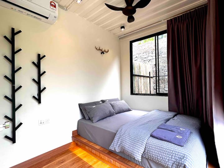 Second Bedroom is located on ground floor comes with a queen sized bed able to accommodate 2 pax. One mattress can be added at RM80 per set