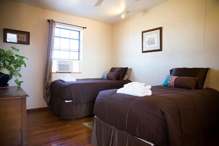 Room 4 with 2 twin beds and a private bathroom