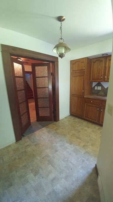 French doors from kitchen to 2 bedroom suite