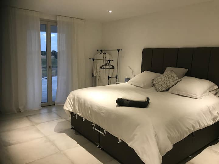 Bedroom 3 on the ground floor opening on to the terrace by the pool. Superking bed or 2 large singles! You can choose!