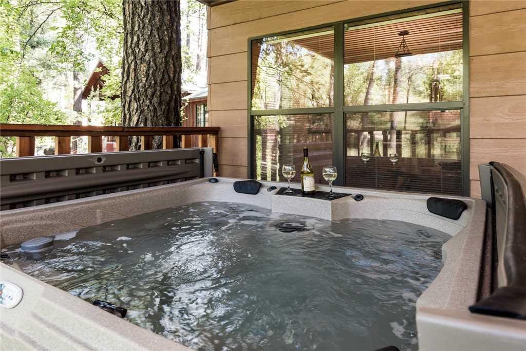 Soothing Waters - Imagine ending each day in the hot tub while you celebrate another perfect day on your vacation. After a long e