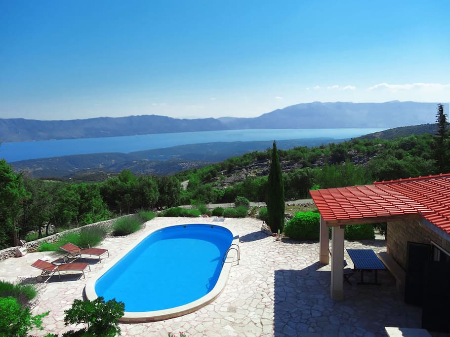 Sea view, garden view, pool view and mountain view. Small bay directly under pool on photo is small town Pucisca, 6 km away.