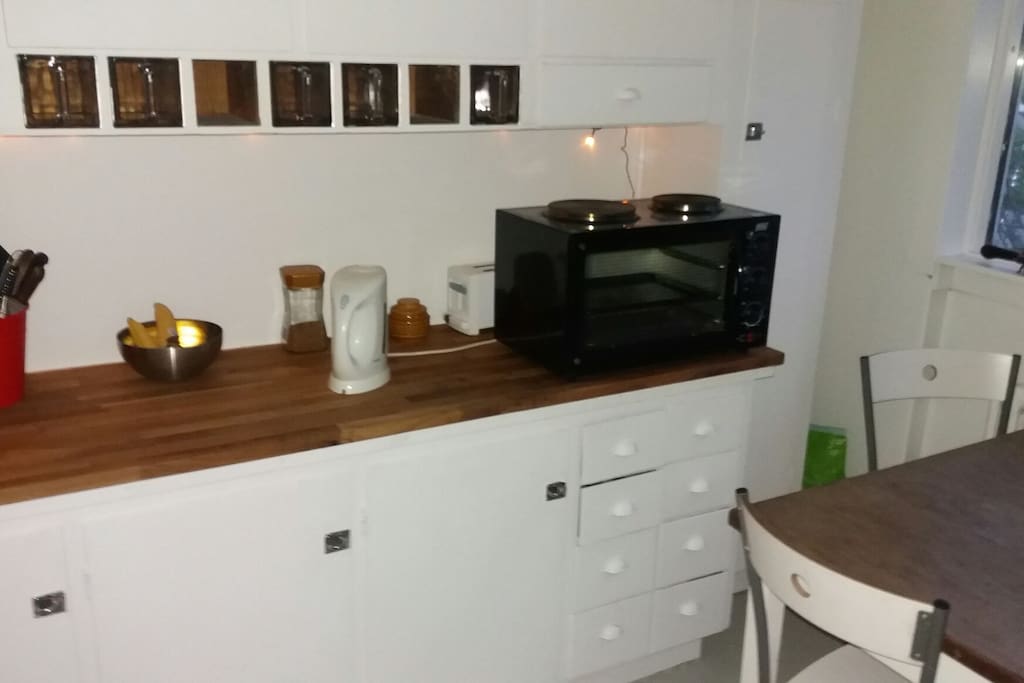 Shared kitchen . Bathroom and living room