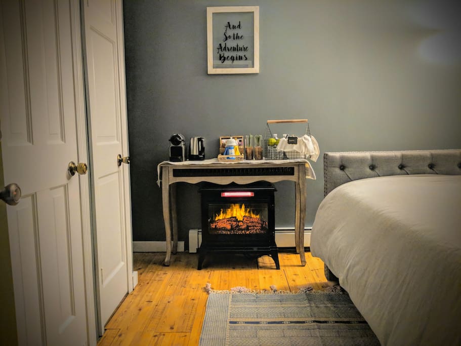 Cozy up by the fireplace.