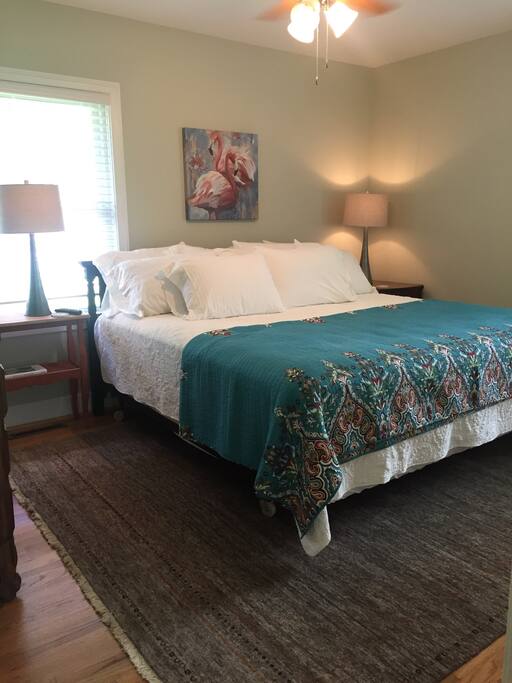 Master bedroom with king size bed.