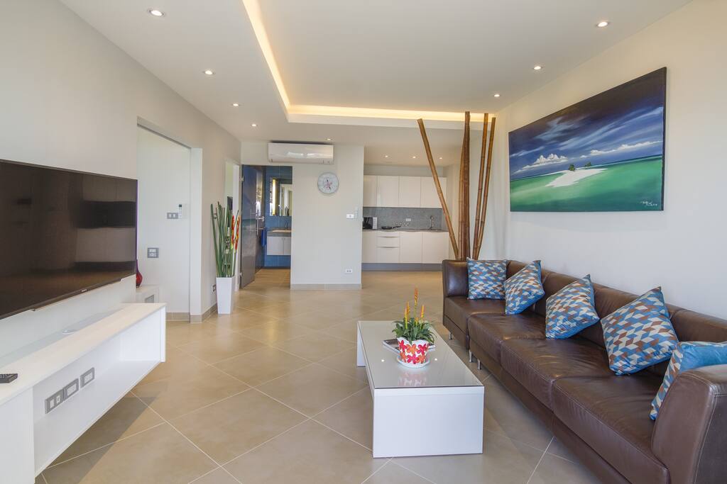 The living-room towards kitchenette and entrance area