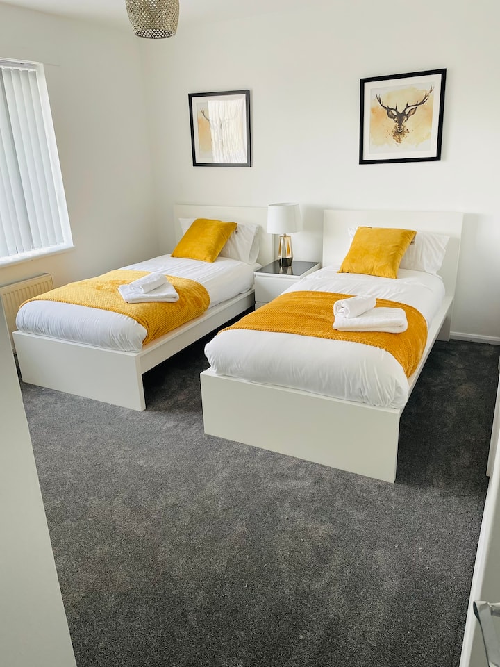 Camas individuales en una habitación doble