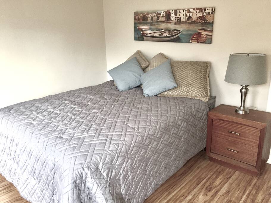 Master bedroom with queen bed