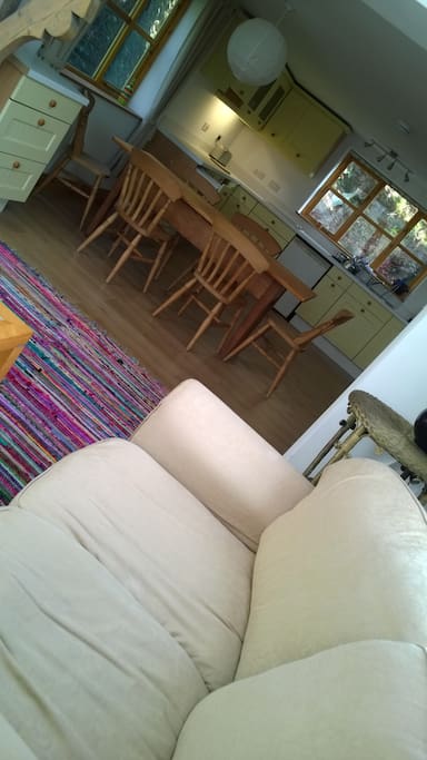 Open plan ground floor living space with fully fitted kitchen