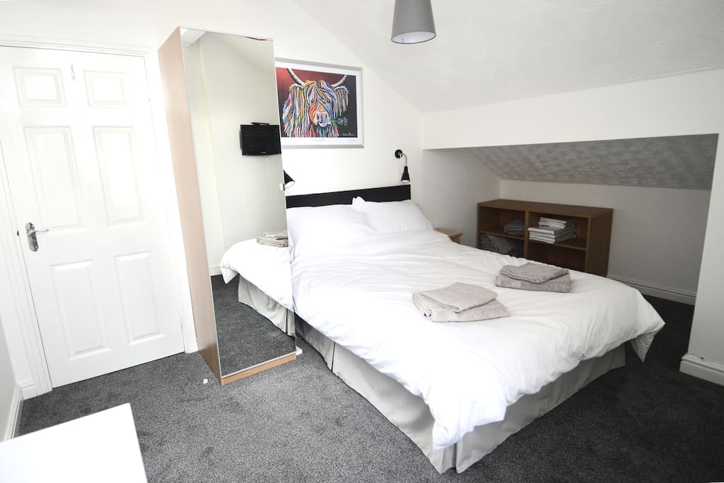 Bedroom #2 - double bed, wardrobe, storage shelves, wall mounted TV (not pictured)
