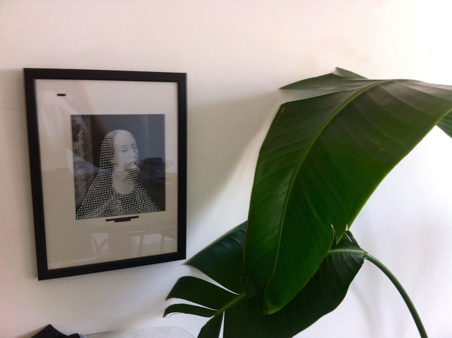 Banana tree and one of the art works in the entrance room.
