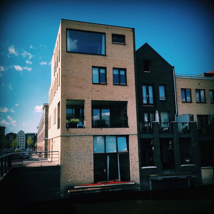 This is our house from the outside. As you can see it has much space. On front you can see a balcony. In the morning the sun shines beautifully on it.