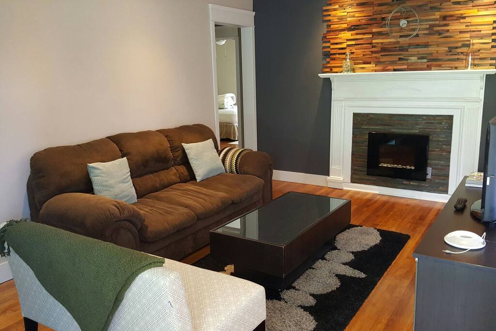 Living room seating & new electric fireplace.