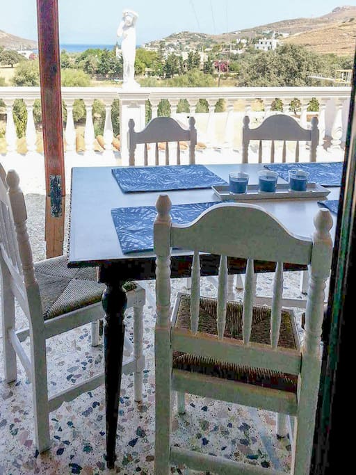 As it is evident from the photos, there is a big beautiful garden that surrounds the house. You will be able to enjoy your meal at the big table positioned at the balcony of the house, with a view to the sea.