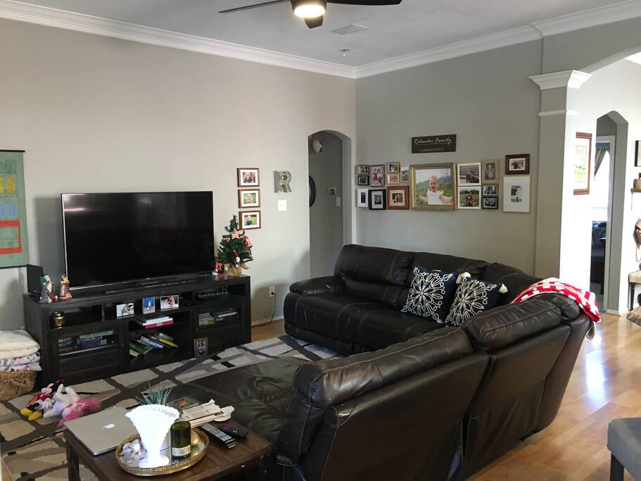 Leather sectional with 60" 4K TV
