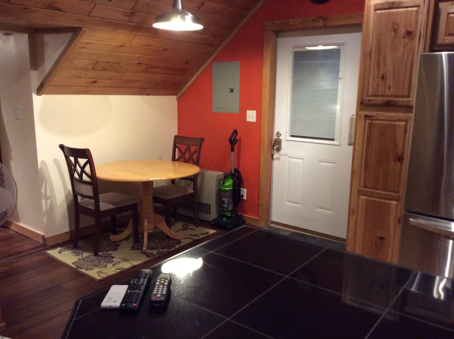 Dining area, door leads to 2nd floor deck overlooking private yard