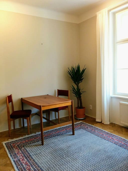 Dining table comfortably seats four people.