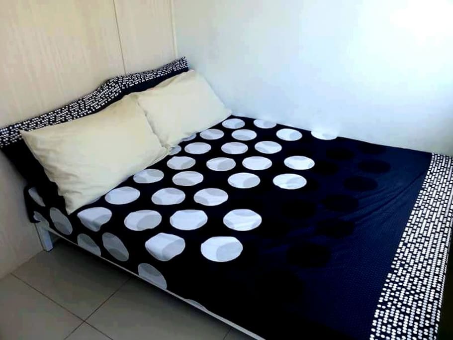 Queen-sized bed in the room