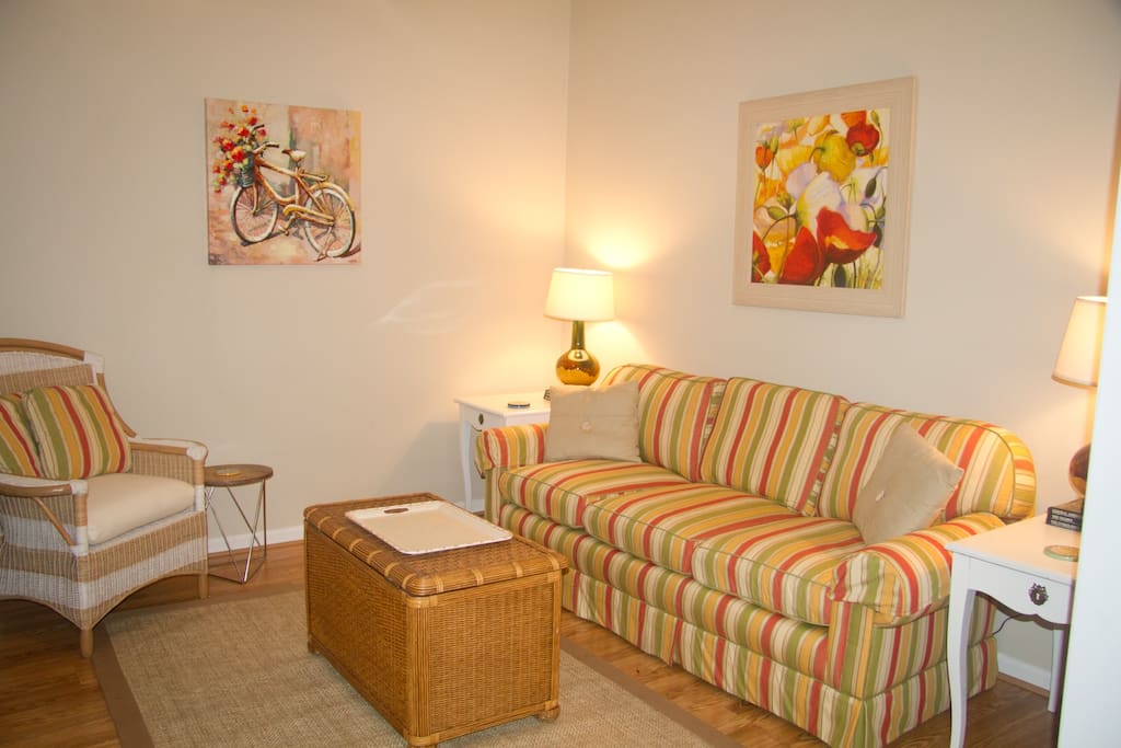 Cheerful living room complete with 50" smart tv
