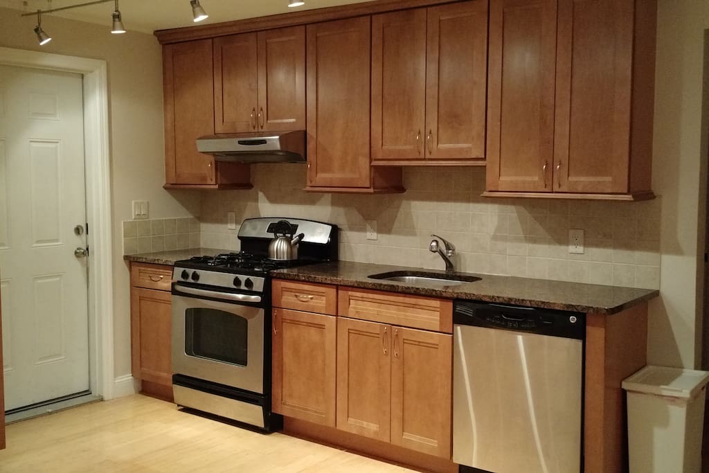 Gas oven and dishwasher in spacious kitchen