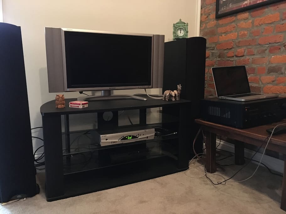 Digital TV connected to digital cable. Powerful sound from the floor speakers (if desired).
