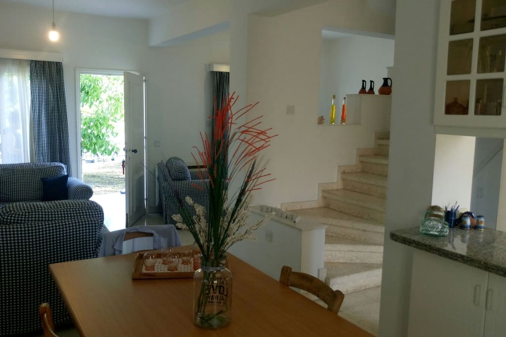 view of stairs and entrance from dinning room
