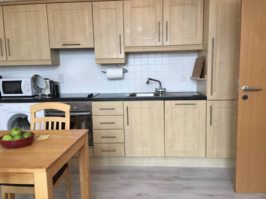 Kitchen with all amenities for cooking delicious meals.