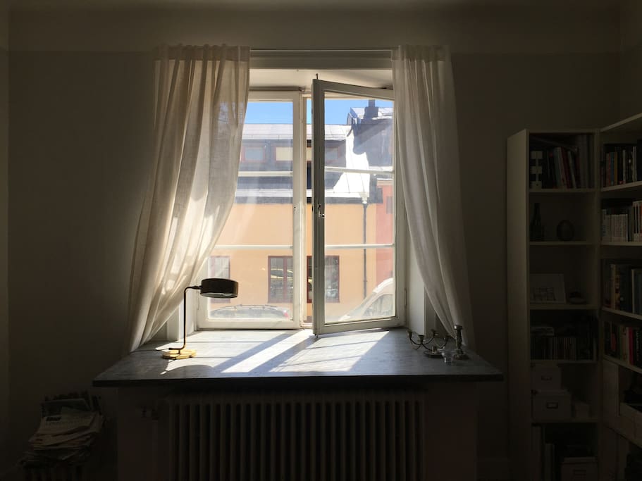 Spacious window overlooking a calm, quiet street