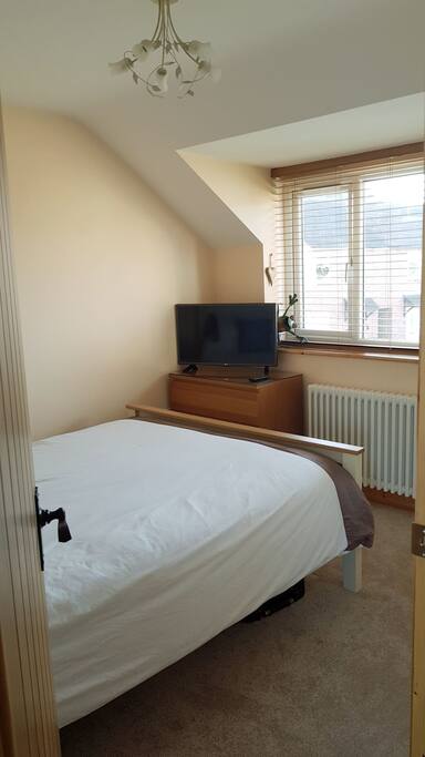 Bedroom- TV large window