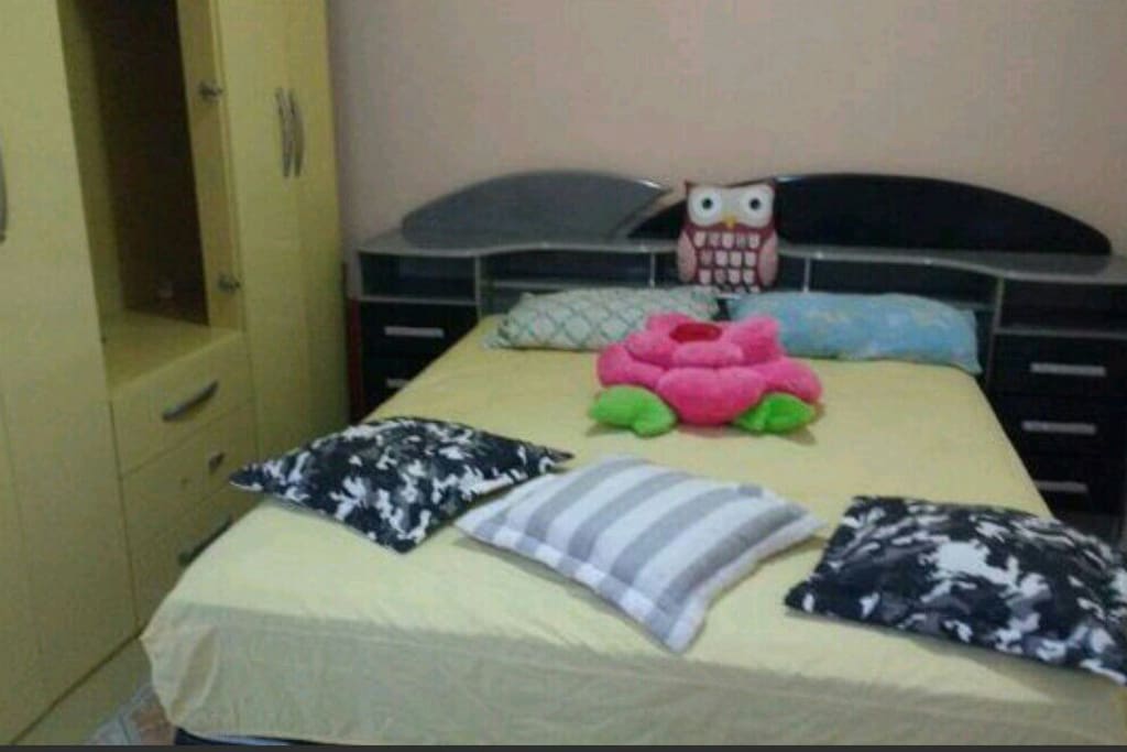 cama box de casal e ventilador de teto