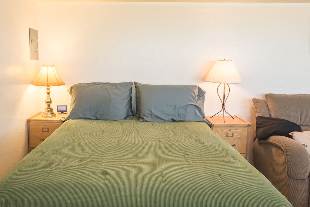 Comfy new queen bed.