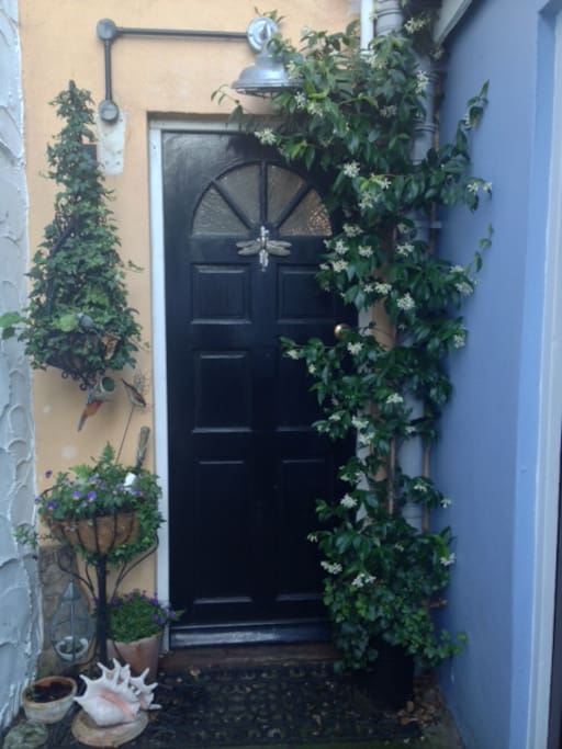 Door to Hummingbird House, along the path, once you've come through the garage door.