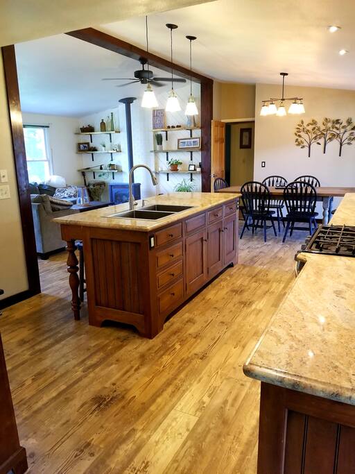 Kitchen, dining room and living room.