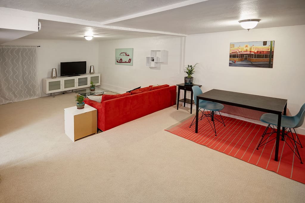 View from Dining area - behind the curtain is a closet that holds an extra foam mattress for the floor, a cot and an air mattress