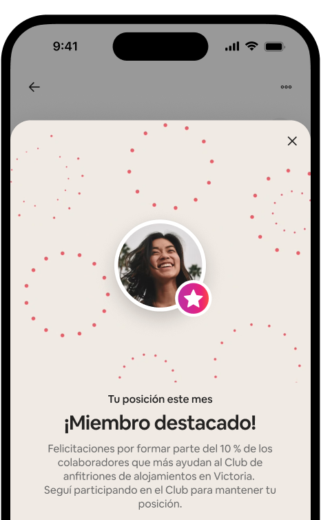Un celular muestra una ventana de celebración para un Miembro destacado, con un avatar de anfitrión y una insignia de su categoría.