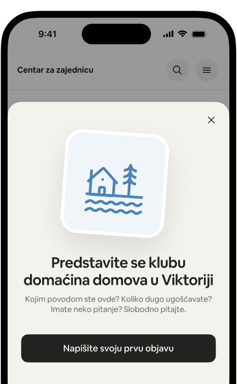 Na telefonu se prikazuje kartica dobrodošlice „Predstavite se klubu domaćina domova u Viktoriji“ sa dugmetom „Kreirajte svoju prvu objavu“.