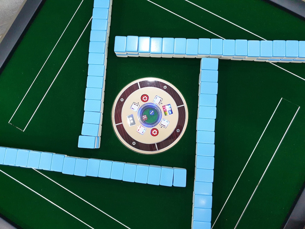 Play high-tech mahjong with a local family