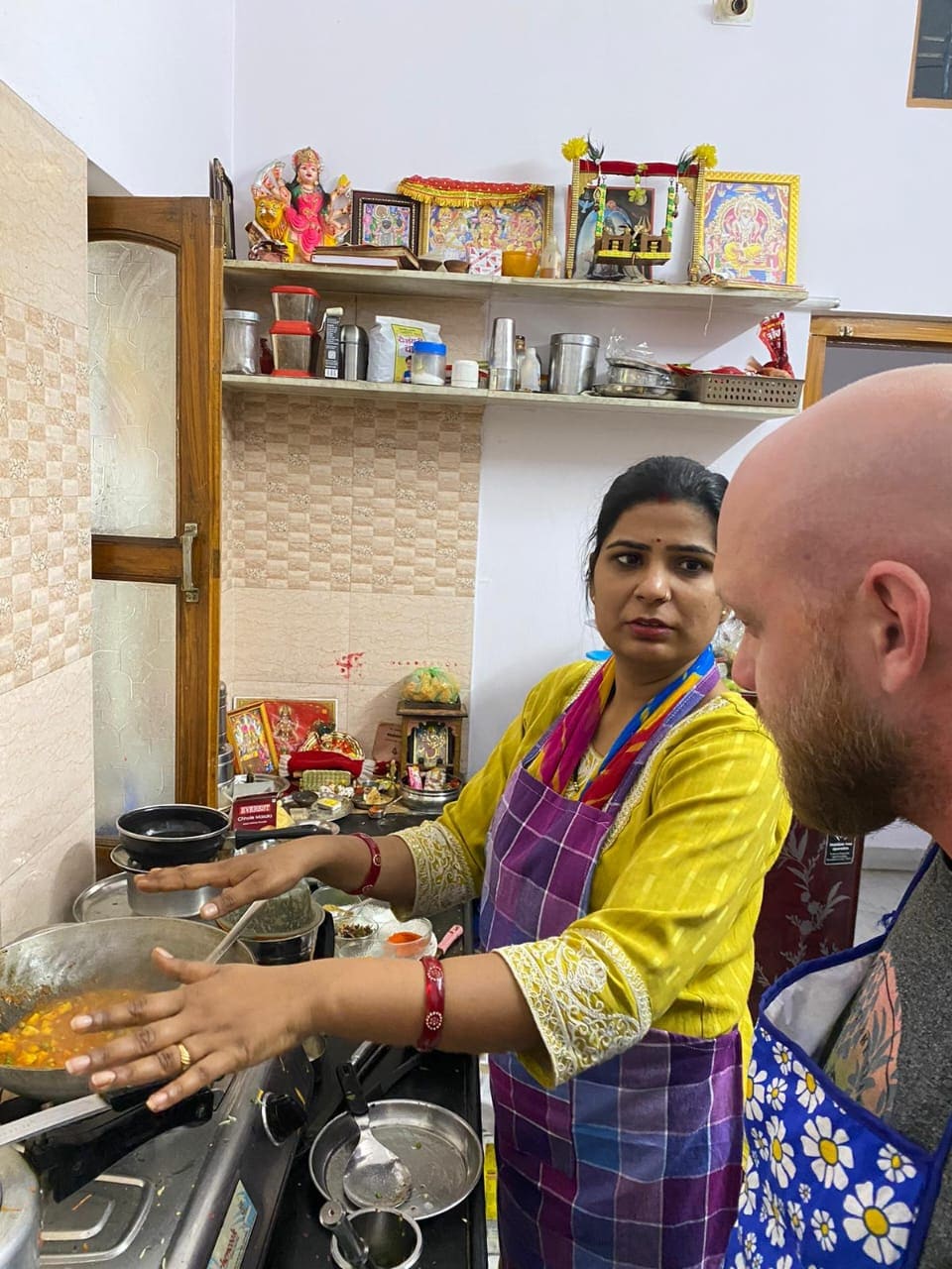 Cook and dine with the Rekha family in our home