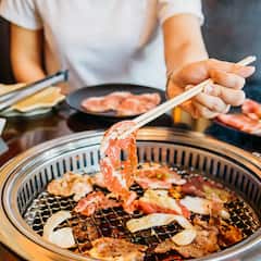 Experience vibrant nightlife and a Korean BBQ