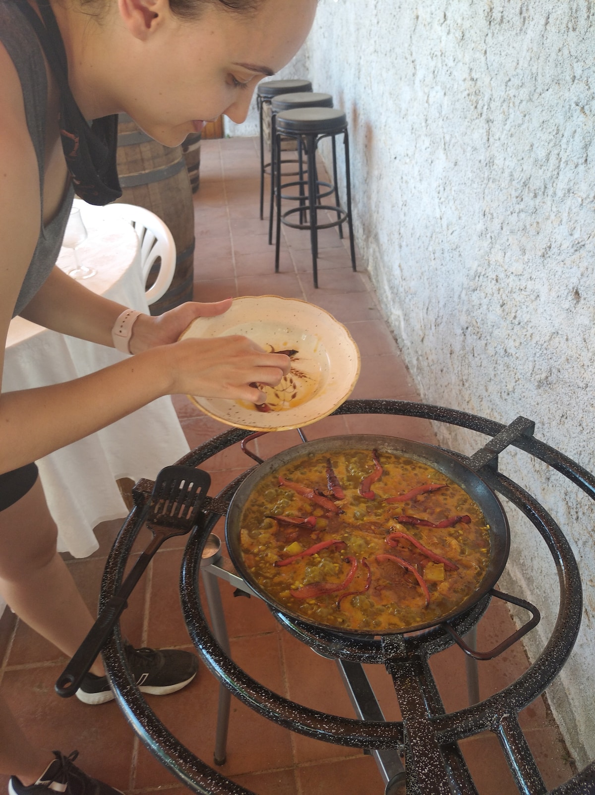 Ride bikes, cook paella, and taste wine in Penedes