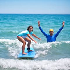 Learn to surf with a local Pro Surfer